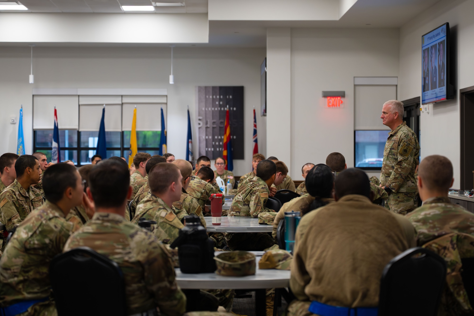 U.S. Air Force Col. Matthew Norton, 17th Training Wing commander, speaks at a welcoming brief at the Cressman Dining Facility.