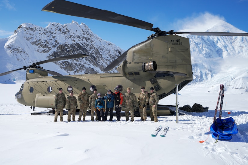 Alaska Army National Guard CH-47F Chinook aircrew members and National Park Service personnel assigned to Denali National Park and Preserve’s Denali Rescue Team offload equipment at Denali Base Camp on the Kahiltna Glacier, April 14, 2026. The crews delivered more than 5,500 pounds of cargo to support the establishment of base camp operations ahead of the climbing season on Mount McKinley.