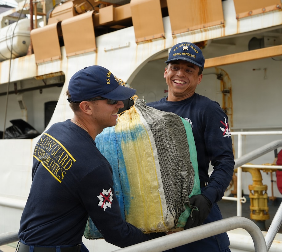 Coast Guard Cutter Resolute’s (WMEC-620) crew members offload $19.3 million worth of illicit drugs at Coast Guard Base Miami Beach, April 23, 2026. The seized contraband was a result of three interdictions in the Caribbean Sea by the crews of the Coast Guard Cutter Tahoma and USS Billings with an embarked Coast Guard law enforcement detachment (U.S. Coast Guard photo by Seaman Nicholas LaPara)
