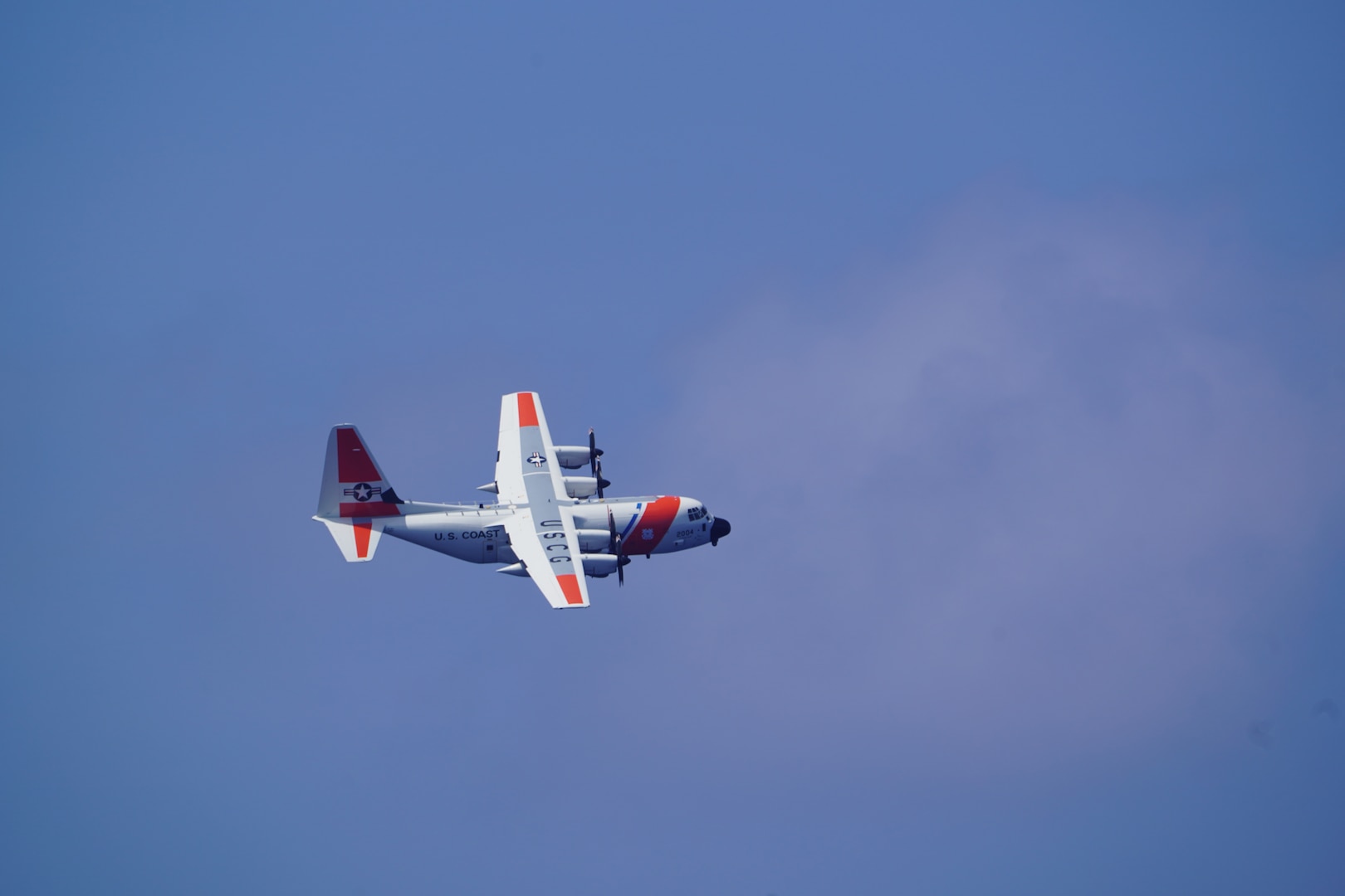 An HC-130 Hercules airplane crew assigned to U.S. Coast Guard Air Station Barbers Point in Kapolei, Hawaii, flies over the overturned cargo vessel Mariana northeast of Pagan in the Commonwealth of the Northern Mariana Islands April 19, 2026. The Coast Guard and partners continue to search for the five missing crewmen and an orange 12-person life raft in the vicinity of the Commonwealth of the Northern Mariana Islands.  (U.S. Coast Guard photo, courtesy Cutter Frederick Hatch)