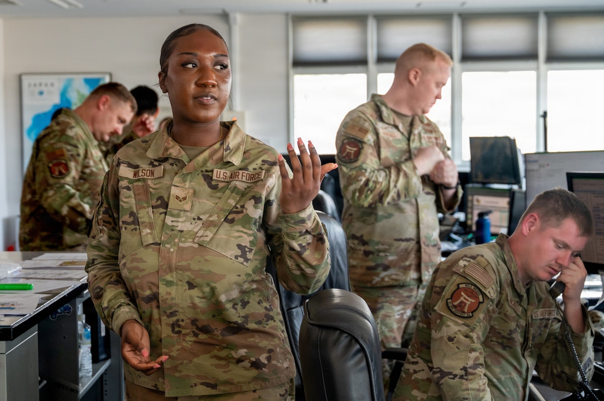 U.S. Air Force Senior Airman Jarese Wilson, 35th Operations Support Squadron airfield management shift lead, explains her role to 35th Fighter Wing leaders during a Wild Weasel Walk-through at Misawa Air Base, Japan, April 20, 2026. The Wild Weasel of the Week program recognized Wilson for her leadership and dedication to ensuring safe and efficient airfield operations, supporting the 35th Fighter Wing’s mission to maintain combat-ready airpower in the Indo-Pacific region. (U.S. Air Force photo by Airman 1st Class Angelica Winther)