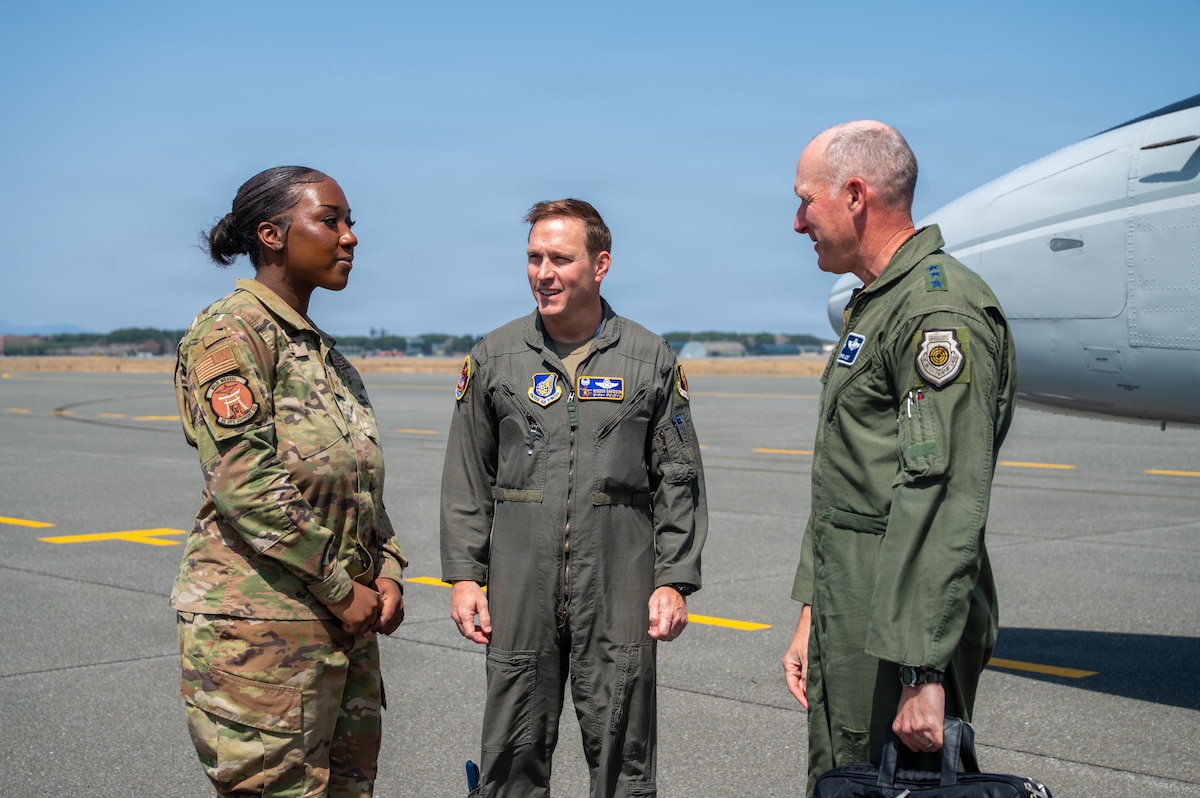 U.S. Air Force Senior Airman Jarese Wilson, left, 35th Operations Support Squadron airfield management shift lead, shares insights with Lt. Gen. Stephen Jost, right, U.S. Forces Japan commander, and Col. Paul T. Davison, 35th Fighter Wing commander, at Misawa Air Base, Japan, April 20, 2026. She discussed her Air Force career and experiences in airfield management, highlighting how her work contributes to the wing’s ability to generate and project combat airpower in the Indo-Pacific region. (U.S. Air Force photo by Airman 1st Class Angelica Winther)