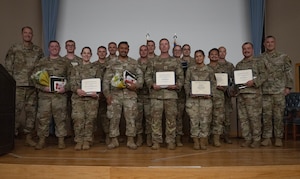 The newest Community College of the Air Force graduates and leadership from the 47th Flying Training Wing come together for a group photo at Laughlin Air Force Base, Texas, April 21, 2026. Over 30 U.S. Air Force Airmen received CCAF diplomas during a graduation ceremony. (U.S. Air Force photo by Airman 1st Class Darryl Keith)