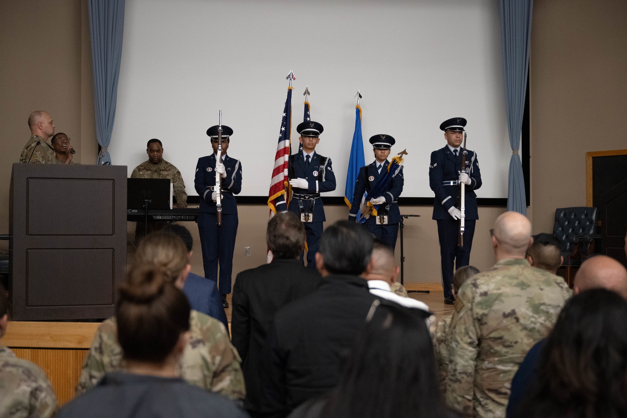The 47th Flying Training Honor Guard presents the colors during a Community College of the Air Force graduation ceremony at Laughlin Air Force Base, Texas, April 21, 2026. The presentation of colors is a timed honored military tradition to mark the beginning of official ceremonies. (U.S. Air Force photo by Airman 1st Class Darryl Keith)