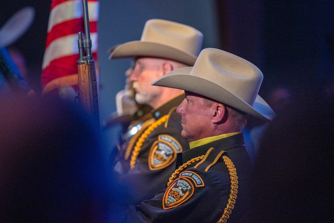 An honor guard from the Jefferson County Sheriff’s Department presents the colors during a ceremony at Fairdale Christian Church in Louisville, Ky., April 20, 2026, to recognize first responders from more than 40 agencies who responded to the deadly crash of a cargo plane last year. Eight firefighters from the Kentucky Air National Guard were among the first emergency responders to arrive at the crash site and worked with dozens of others to bring a raging fire under control. (U.S. Air National Guard photo by Phil Speck)