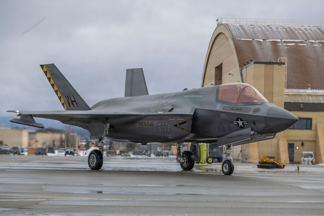 U.S. Marines with Marine Fighter Attack Squadron (VMFA) 542, Marine Aircraft Group 14, 2nd Marine Aircraft Wing, prepare a F-35B Lightning II aircraft for familiarization flights during exercise RED FLAG-Alaska 26-1 at Eielson Air Force Base, Alaska, April 20, 2026. Red Flag-Alaska an exercise is designed to simulate complex scenarios, providing unique opportunities to integrate various forces into joint, coalition, and multilateral training from simulated forward operating bases, enhancing our ability to respond effectively to contingencies in the region. (U.S. Marine Corps photo by Lance Cpl. Bryan Giraldo)