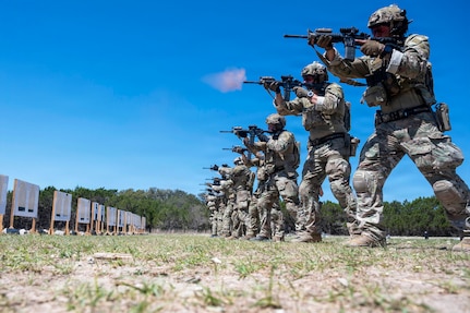 Tactical Air Control Party Airmen assigned to Detachment 2, 6th Combat Training Squadron, conduct small arms training with an M4 carbine at Joint Base San Antonio–Camp Bullis, Texas, April 8, 2026. The training focuses on weapon proficiency, close-quarters battle and combat scenarios to prepare Airmen for integrating airpower with ground maneuver units. (U.S. Air Force photo by Melissa Hydrick)