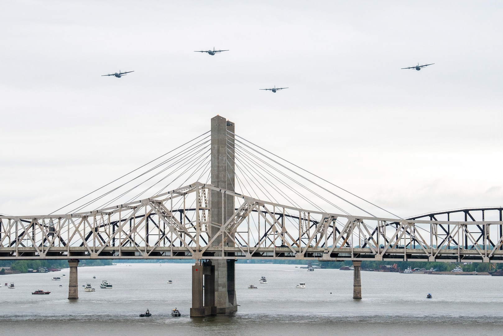 Four Kentucky Air National Guard C-130J Super Hercules fly over the Ohio River during the Thunder Over Louisville air show at Louisville, Ky., April 18, 2026. The Kentucky Air Guard’s 123rd Airlift Wing served as the base of operations for military aircraft participating in the show. (U.S. Air National Guard photo by Senior Master Sgt. Phil Speck)