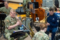 U.S. Air Force Master Sgt. Kevin A. Cerovich, left, music director and trombonist, and Tech. Sgt. Will Nathman, a saxophonist, both with The U.S. Air Force Band’s Airmen of Note, perform during an open rehearsal at Joint Base Anacostia-Bolling, Washington, D.C., April 6, 2026.  The Airmen of Note ensemble was created in 1950 as a continuation of U.S. Air Force Maj. Glenn Miller’s Army Air Force dance band. (U.S. Air Force photo by Airman 1st Class Brandon Thomas)