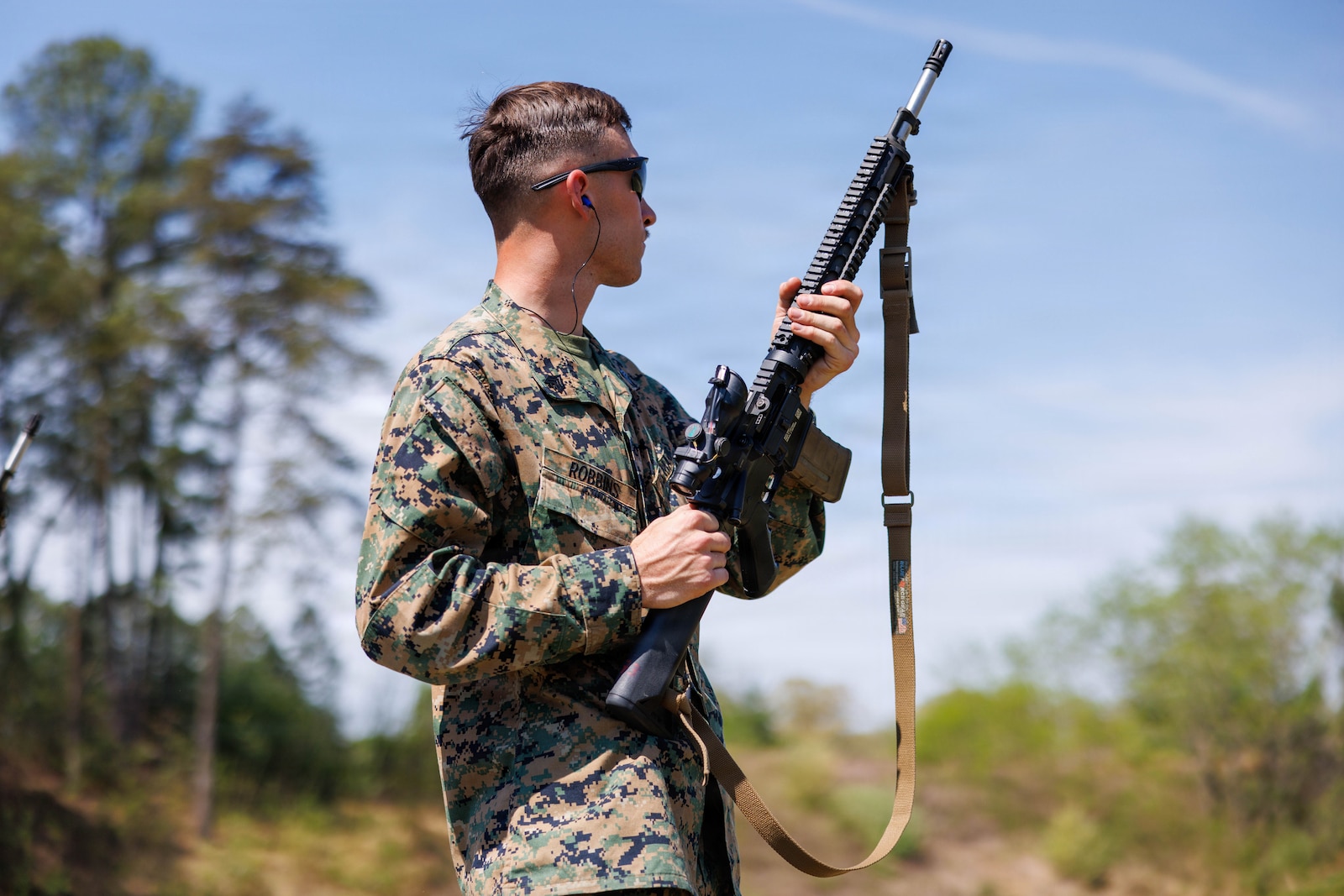 U.S. Marine Corps Sgt Elijah Robbins, a marksmanship instructor with the Marine Corps Marksmanship Team, prepares to fire during the Marine Corps Rifle Competition at Weapons Training Battalion on Marine Corps Base Quantico, April 15, 2026. The competition showcases the Marine Corps’ top shooters from regional competitions to determine the top rifle and pistol competitors, while also featuring team matches, night fire, and counter-UAS marksmanship. (U.S. Marine Corps photo by Lance Cpl. Federico S. Marquez)