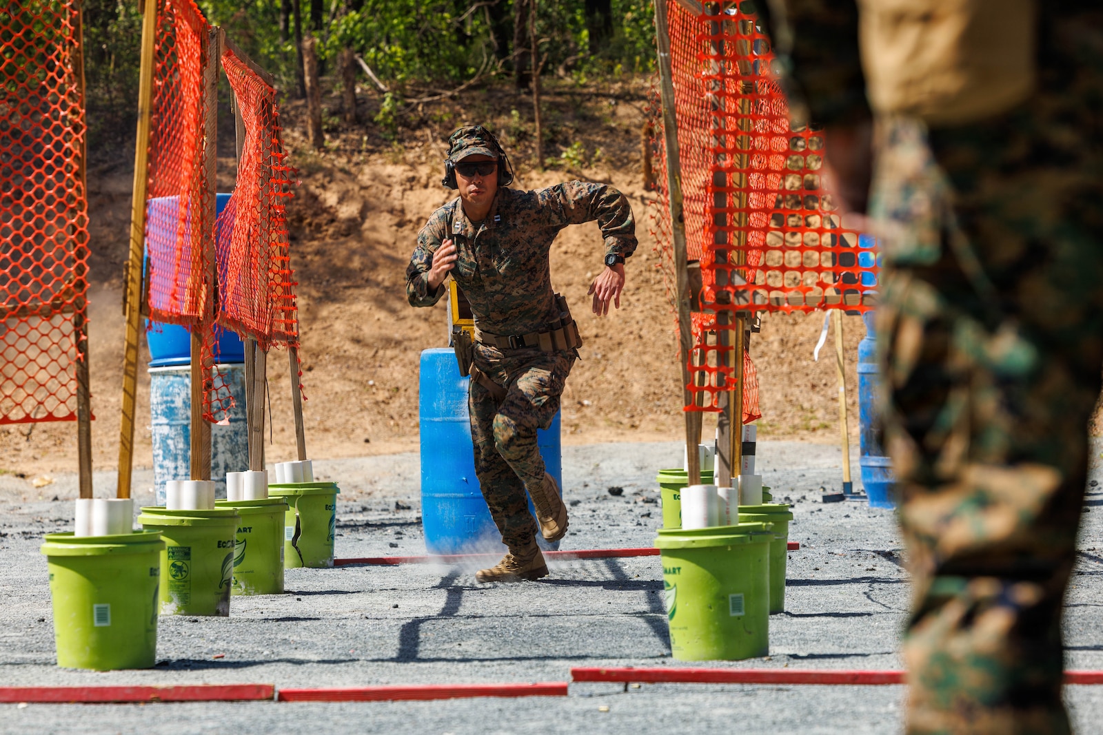 U.S. Marine Corps Capt. Calvin Tang, an operations officer with 3rd Intelligence Battalion, III Marine Expeditionary Force, maneuvers between targets during the Marine Corps Marksman Competition at Weapons Training Battalion on Marine Corps Base Quantico, April 21, 2026. The competition showcases the Marine Corps’ top emerging shooters from regional competitions to determine the top rifle and pistol competitors, while also featuring team matches, night fire, and counter-UAS marksmanship. (U.S. Marine Corps photo by Lance Cpl. Federico Marquez)
