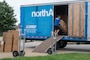 Boxes are loaded onto a moving truck as part of a Permanent Change of Station on Scott Air Force Base, Illinois, July 18, 2025. The Department of Defense established the Permanent Change of Station Joint Task Force to improve the moving experience for military members and their families. (U.S. Air Force photo by Staff Sgt. Stephanie Henry)