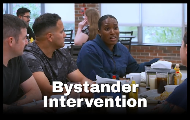 A screenshot photo manipulation of a group of Coast Guard members sitting around a table, in discussion.