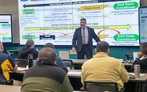 DAHLGREN, Va. – Professor C.A. "K-Jack" Krajacich, director of Maritime Staff Courses at the U.S. Naval War College, teaches the first Naval Surface Warfare Center Dahlgren Division (NSWCDD) Wartime Readiness Short Course to a room full of Sailors and civilians. The course is designed to provide perspective on how maritime operations centers support the fleet. (Matt Lyman/NSWCDD Photo)