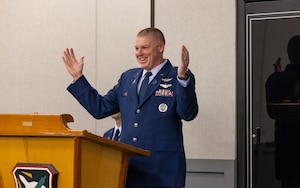 Lt. Col. David Heinz, commander of the 593rd Test and Evaluation Squadron, gives a speech during the 593rd Test and Evaluation Squadron, Space Delta 12, activation ceremony April 20, 2026, at Edwards Air Force Base, California. “I'm really excited to be able to be a part of that mission set,” he shared. “The mission of the 593rd is to educate and train multidomain professionals who are highly adaptive, critical thinking, integrated testers, and evaluating leaders to drive data formed decisions at speed, and secure national advantage across the spectrum aerospace operations for our joint force and nation.” (U.S. Air Force photo by Daniel Kelley, 412th Test Wing Public Affairs)