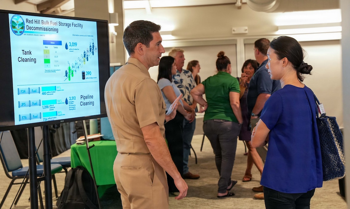 Capt. Robert Kleinman, decommissioning director, Navy Closure Task Force-Red Hill (NCTF-RH), speaks with a community member during the NCTF-RH open house at the Pearl at Kalauao in Honolulu, April 15, 2026. The open house focused on current and future efforts of NCTF-RH and provided community members with opportunities to speak one-on-one with subject matter experts who are actively involved in the Red Hill Bulk Fuel Storage Facility (RHBFSF) decommissioning and the Navy’s ongoing environmental efforts. Charged with the safe decommissioning of the facility, NCTF-RH was established by the Department of the Navy as a commitment to the community and the environment. The Navy continues to engage with the people of Hawaii, regulatory agencies, and other stakeholders as NCTF-RH works to safely and deliberately decommission the RHBFSF. (U.S. Navy photo by Mass Communication Specialist 1st Class Glenn Slaughter)