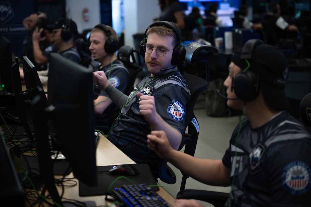 U.S. guardians celebrate a win after a match during the 2026 Armed Forces Esports Championship at Localhost in Philadelphia, Pennsylvania, April 24, 2026. Service members competed in organized esports competition playing Marvel Rivals for championship honors while representing their respective services. Armed Forces Sports brings together service members from the Army, Marine Corps, Navy, Coast Guard, and Air Force, and Space Force to compete at the national level. Armed Forces Sports promotes physical fitness, cognitive readiness, teamwork, and competitive opportunities for military members while supporting recruitment and retention efforts and strengthening partnerships through emerging sports platforms. (DoW photo by U.S. Marine Corps Sgt. Kayla Halloran)