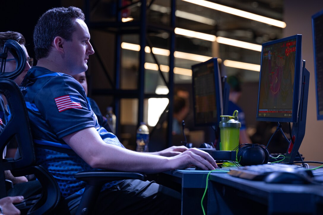U.S. Air Force Maj. Chad Speer, assigned to Lackland Air Force Base, practices before the 2026 Armed Forces Esports Championship at Localhost in Philadelphia, Pennsylvania, April 24, 2026. Service members competed in organized esports competition playing Marvel Rivals for championship honors while representing their respective services. Armed Forces Sports brings together service members from the Army, Marine Corps, Navy, Coast Guard, and Air Force, and Space Force to compete at the national level. Armed Forces Sports promotes physical fitness, cognitive readiness, teamwork, and competitive opportunities for military members while supporting recruitment and retention efforts and strengthening partnerships through emerging sports platforms. (DoW photo by U.S. Marine Corps Sgt. Kayla Halloran)
