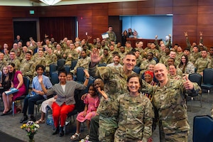 Joint Base Elmendorf-Richardson leadership takes a photo with nominees at the Annual Volunteer Recognition Ceremony on JBER, Alaska, April 22, 2026. The ceremony recognized service members, Airmen, Soldiers, families, civilians, retirees and community partners who volunteered both on and off base and showcased the total recorded volunteer hours and in-kind dollar value, which exceeded $1.5 million in contribution for the year of 2025. (U.S. Air Force photo by Airman 1st Class Keola Vischi)