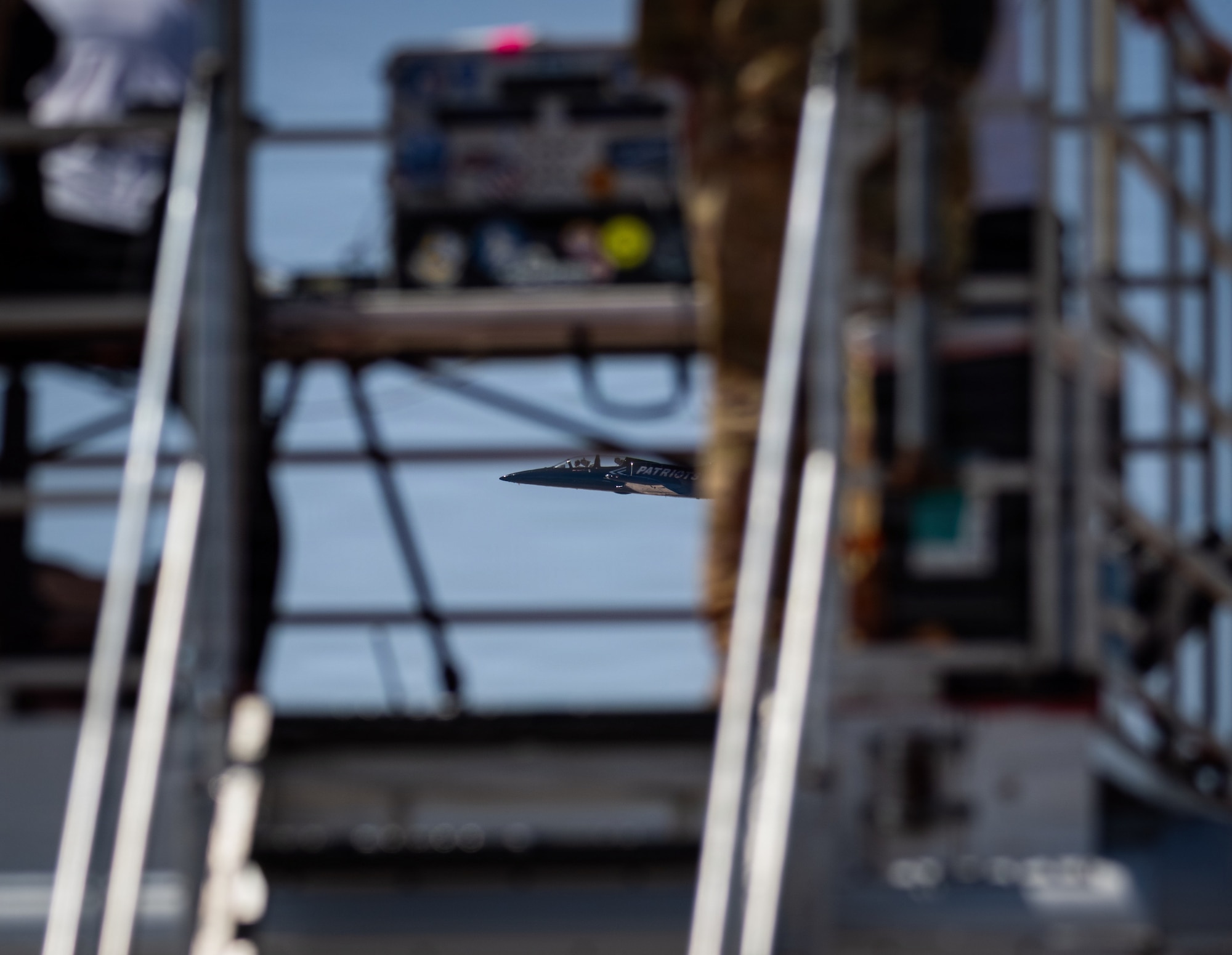 A Patriots Jet Team member performs maneuvers.