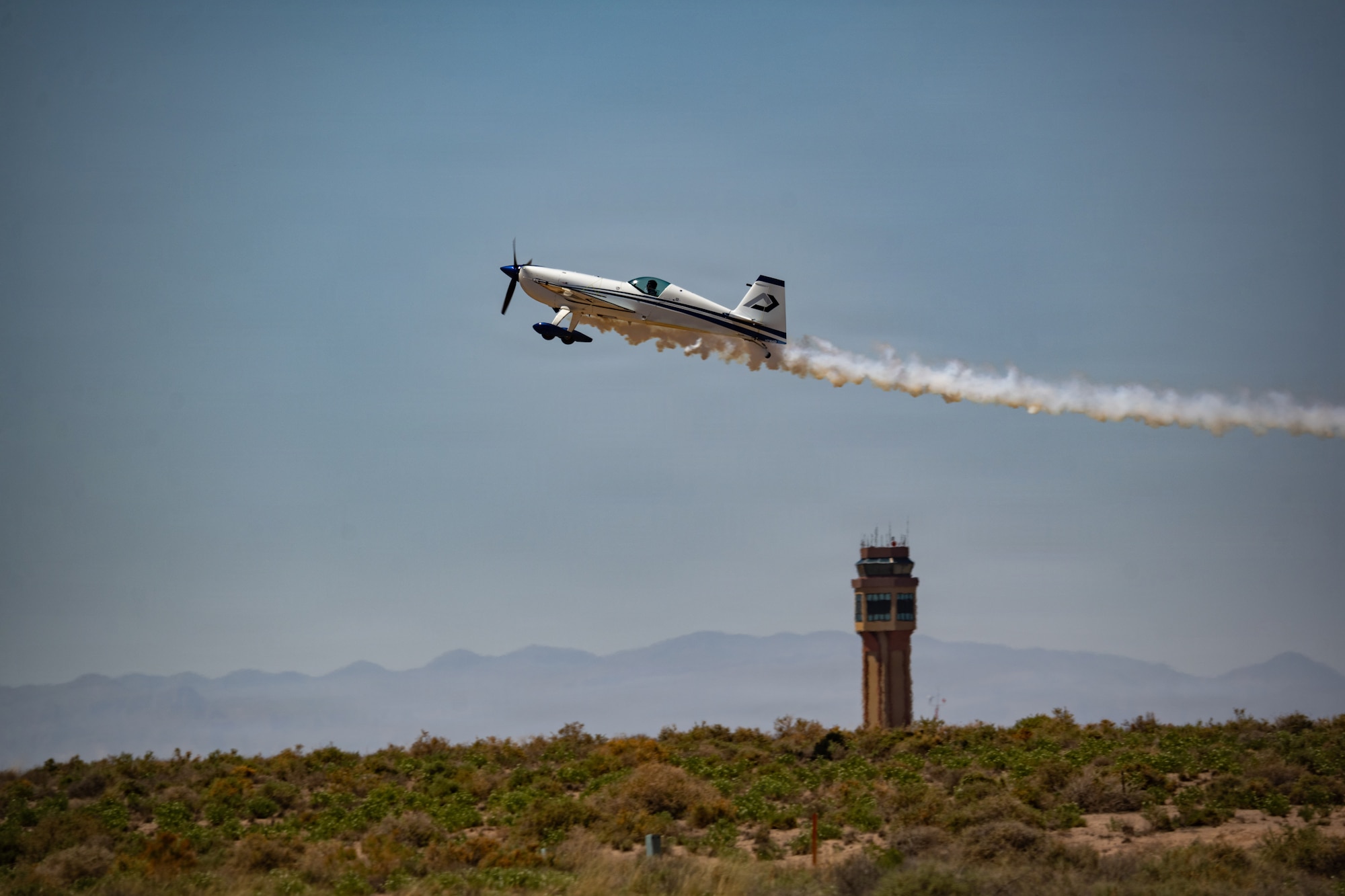 Aarron Deliu, Australian professional stunt pilot, performs aerial maneuvers.