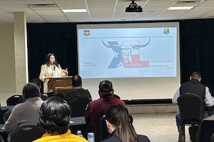 Karina Gloria, 47th Contracting Squadron contracting specialist, provides opening remarks for Industry Day to businesspeople at Laughlin Air Force Base, Texas, April 21, 2026. The goals of the 47th CONS Industry Day were to connect with local contractors, reduce procurement lead time, show upcoming opportunities, and increase overall competition. (U.S. Air Force photo by Capt. Christine Del Aguila)