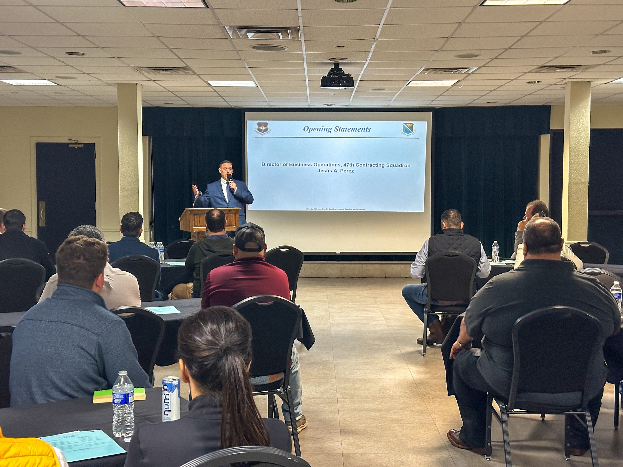 Jesus Perez, 47th Contracting Squadron director of business operations, gives opening statements for Industry Day at Laughlin Air Force Base, Texas, April 21, 2026. Industry Day, hosted in partnership with organizations like the Northwest Texas APEX Accelerator, serves as a critical bridge between the Department of War's operational needs and the dynamic capabilities of the private sector.  (U.S. Air Force photo by Capt. Christine Del Aguila)