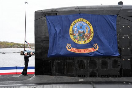 Electronics Technician (Navigation) 2nd Class Zachary M. Pion, assigned to the Virginia-class nuclear-powered fast-attack submarine USS Idaho (SSN 799), raises the commissioning pennant during Idaho’s commissioning ceremony at Naval Submarine Base New London in Groton, Conn., April 25, 2026. Idaho is the newest fast-attack submarine and the fifth U.S. Navy vessel named for the Gem State. Idaho and crew operate under Submarine Squadron (SUBRON) 4, whose primary mission is to provide attack submarines that are ready, prepared, and committed to meet the unique challenges of undersea combat and deployed operations in unforgiving environments across the globe.