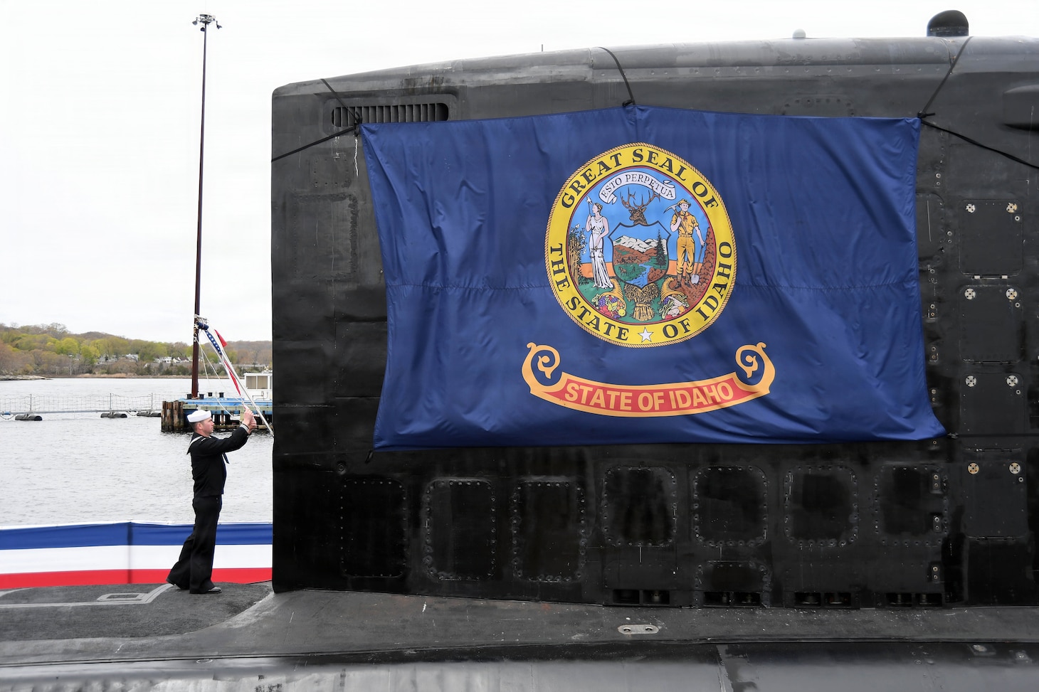 Electronics Technician (Navigation) 2nd Class Zachary M. Pion, assigned to the Virginia-class nuclear-powered fast-attack submarine USS Idaho (SSN 799), raises the commissioning pennant during Idaho’s commissioning ceremony at Naval Submarine Base New London in Groton, Conn., April 25, 2026. Idaho is the newest fast-attack submarine and the fifth U.S. Navy vessel named for the Gem State. Idaho and crew operate under Submarine Squadron (SUBRON) 4, whose primary mission is to provide attack submarines that are ready, prepared, and committed to meet the unique challenges of undersea combat and deployed operations in unforgiving environments across the globe.