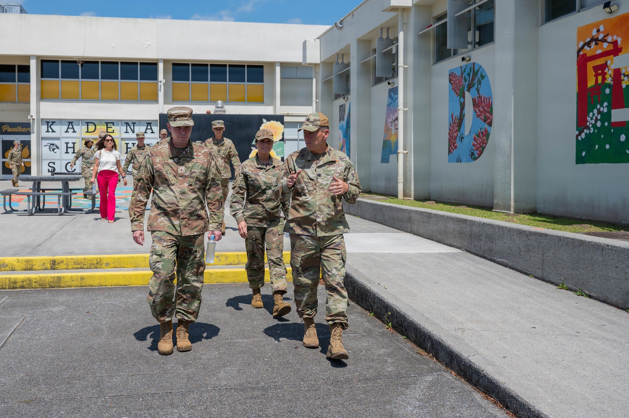 Service members receive a tour of building.