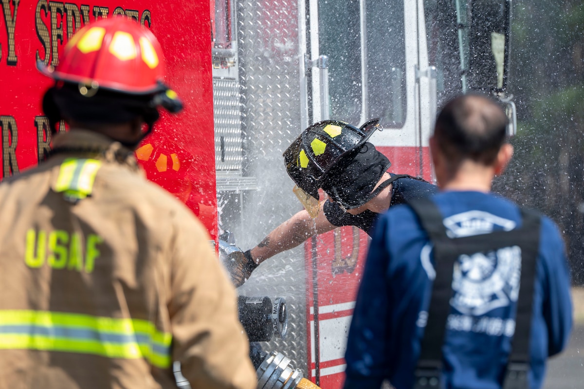 U.S. Air Force firefighters assigned to the 35th Civil Engineer Squadron participate in a first responder training event at Misawa Air Base, Japan, April 8, 2026. Deliberate repetition of these fundamentals sharpens force readiness and sustains the capability required to defend and protect the mission-critical assets and personnel. (U.S. Air Force photo by Senior Airman Gavin Hameed)