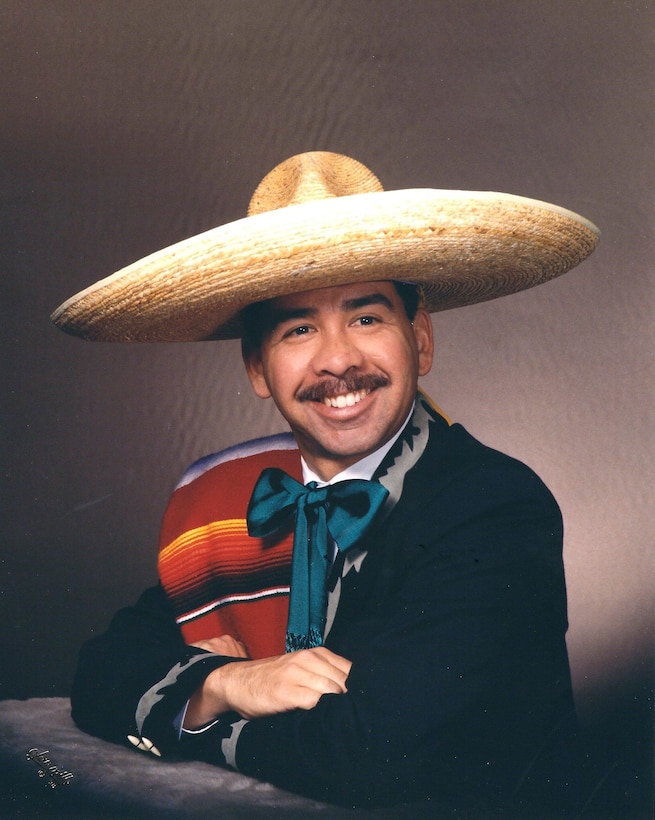 Larry Estrada, deputy district counsel, U.S. Army Corps of Engineers – Far East District, poses for a photo in traditional Mexican folk dance attire. Estrada brings decades of legal expertise and a lifelong passion for dance to his role. (Photo courtesy of Larry Estrada)