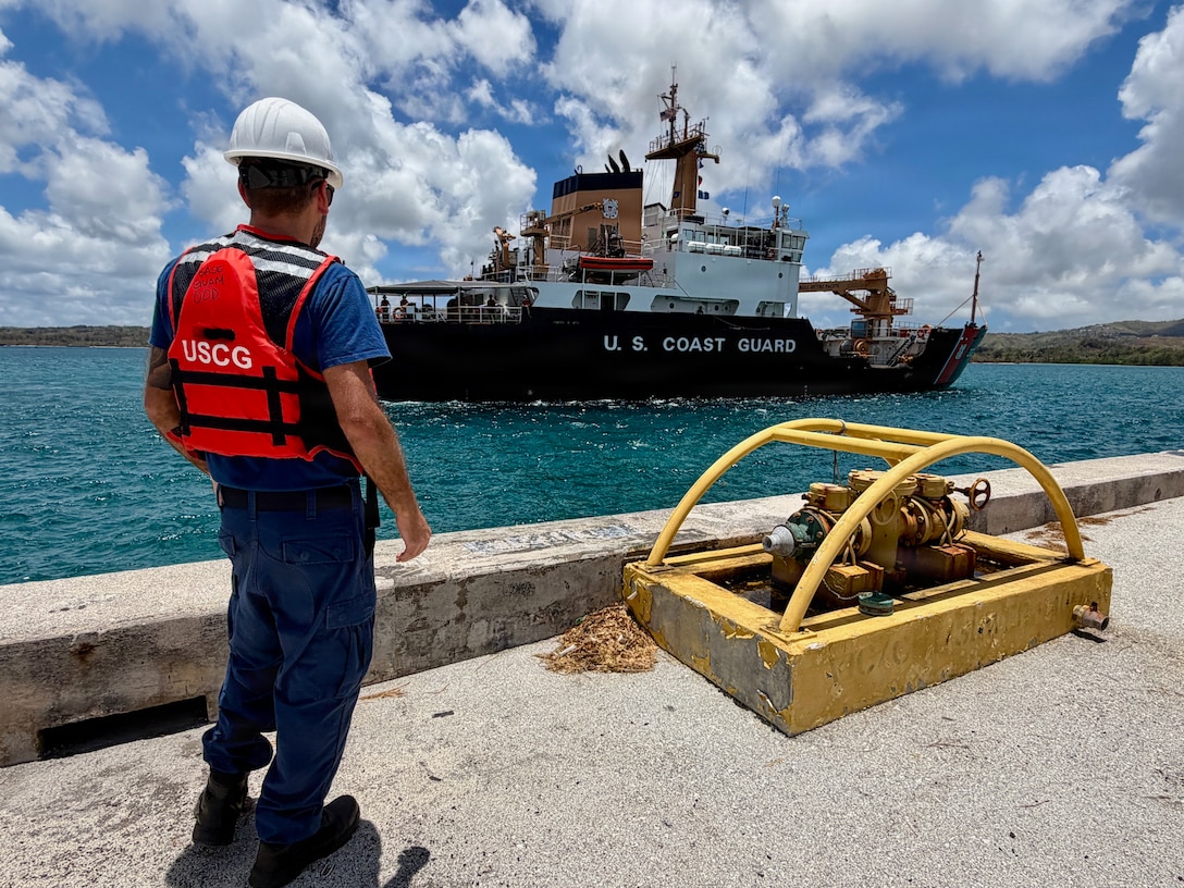 U.S. Coast Guard members aboard USCGC Hickory (WLB 212) return to Guam on April 24, 2026, to resupply and drop off members of the local U.S. Navy Explosive Ordnance Disposal unit after taking relief supplies to Saipan and working aids in Guam and the Commonwealth of the Northern Mariana Islands. U.S. Coast Guard crews pressed north on April 19, 2026, ensuring the safety of Apra Harbor before moving toward communities still isolated by the effects of Super Typhoon Sinlaku, launching a coordinated surge to fully reopen ports across Guam and the Commonwealth of the Northern Mariana Islands and deliver resources. (U.S. Coast Guard photo by Chief Warrant Officer Sara Muir)