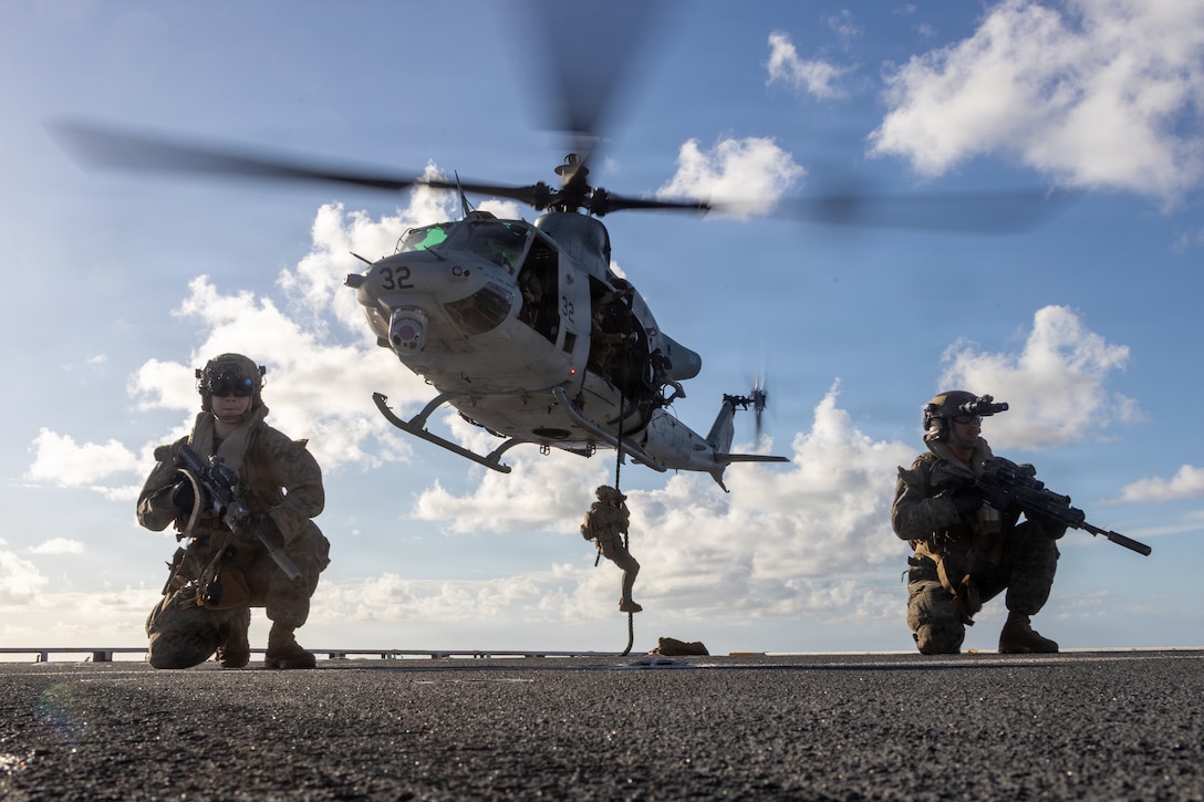 U.S. Marines with Battalion Landing Team 3/6, 22nd Marine Expeditionary Unit (Special Operations Capable), fast rope from a UH-1Y Venom helicopter with Marine Medium Tiltrotor Squadron (VMM) 263 (Reinforced), 22nd MEU (SOC), aboard San Antonio-class amphibious transport dock USS Fort Lauderdale (LPD 28) while underway in the Caribbean Sea, April 15, 2026. U.S. military forces are deployed to the Caribbean in support of the U.S. Southern Command mission, Department of War-directed operations, and the president’s priorities to disrupt illicit drug trafficking and protect the homeland. (U.S. Marine Corps photo)