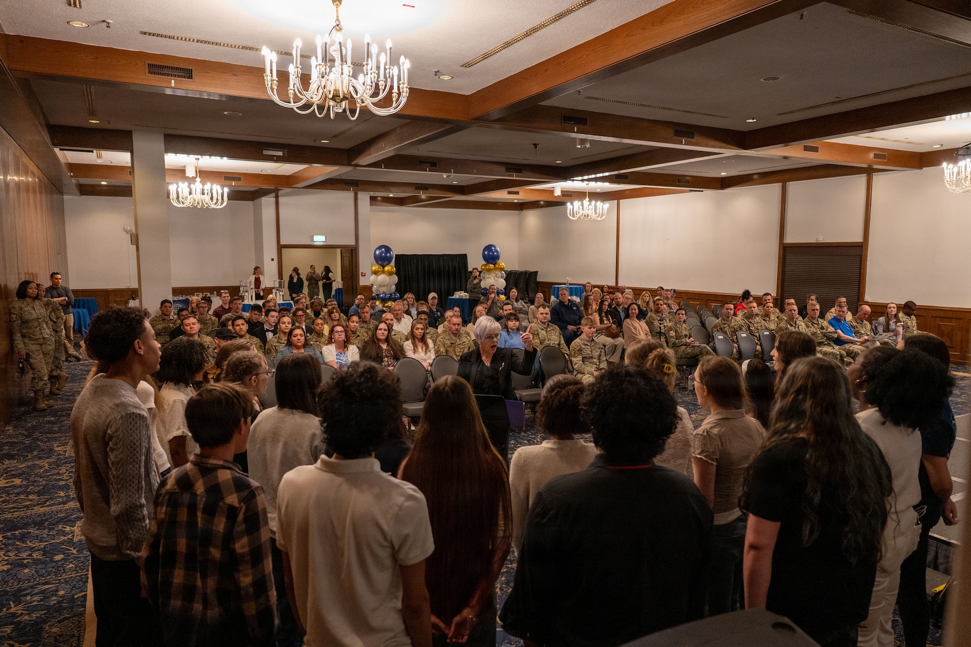 The Ramstein High School Choir performs during the Volunteer Excellence Award ceremony at Ramstein Air Base, Germany, April 24, 2026.