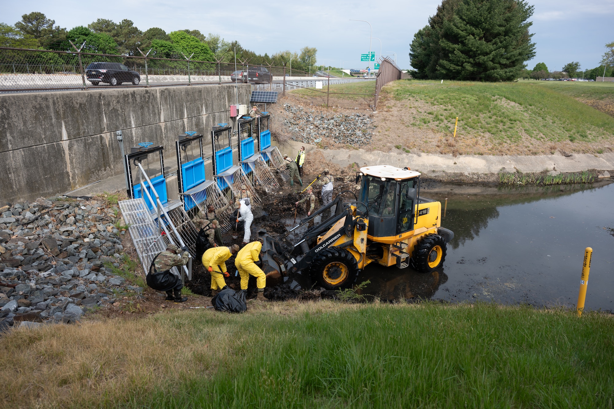 Airmen removed buildup from a drainage outfall to keep water moving and reduce pollution. Small actions like these play a direct role in protecting the environment and supporting the surrounding community.