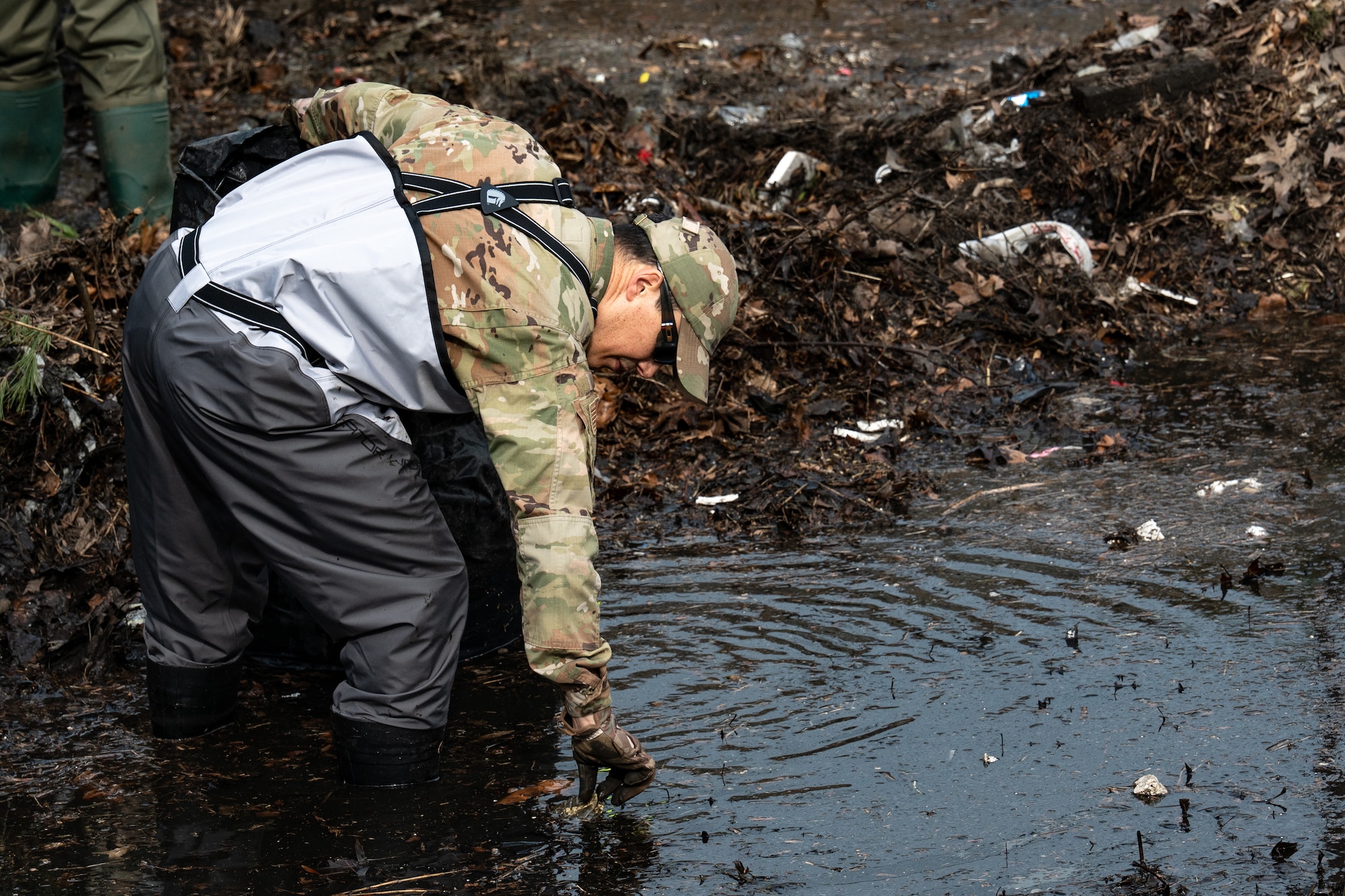 Airmen removed buildup from a drainage outfall to keep water moving and reduce pollution. Small actions like these play a direct role in protecting the environment and supporting the surrounding community.
