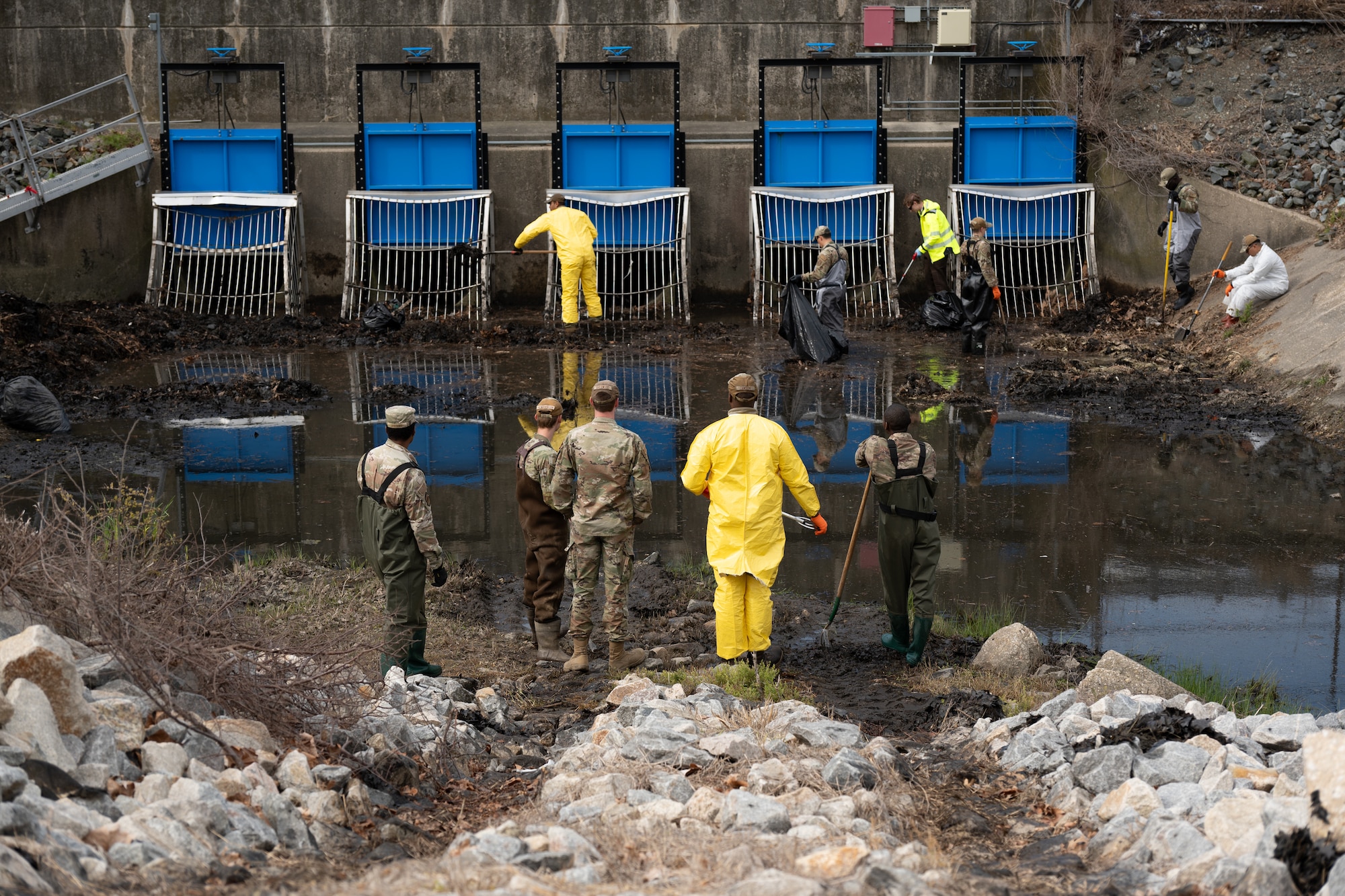 Airmen removed buildup from a drainage outfall to keep water moving and reduce pollution. Small actions like these play a direct role in protecting the environment and supporting the surrounding community.