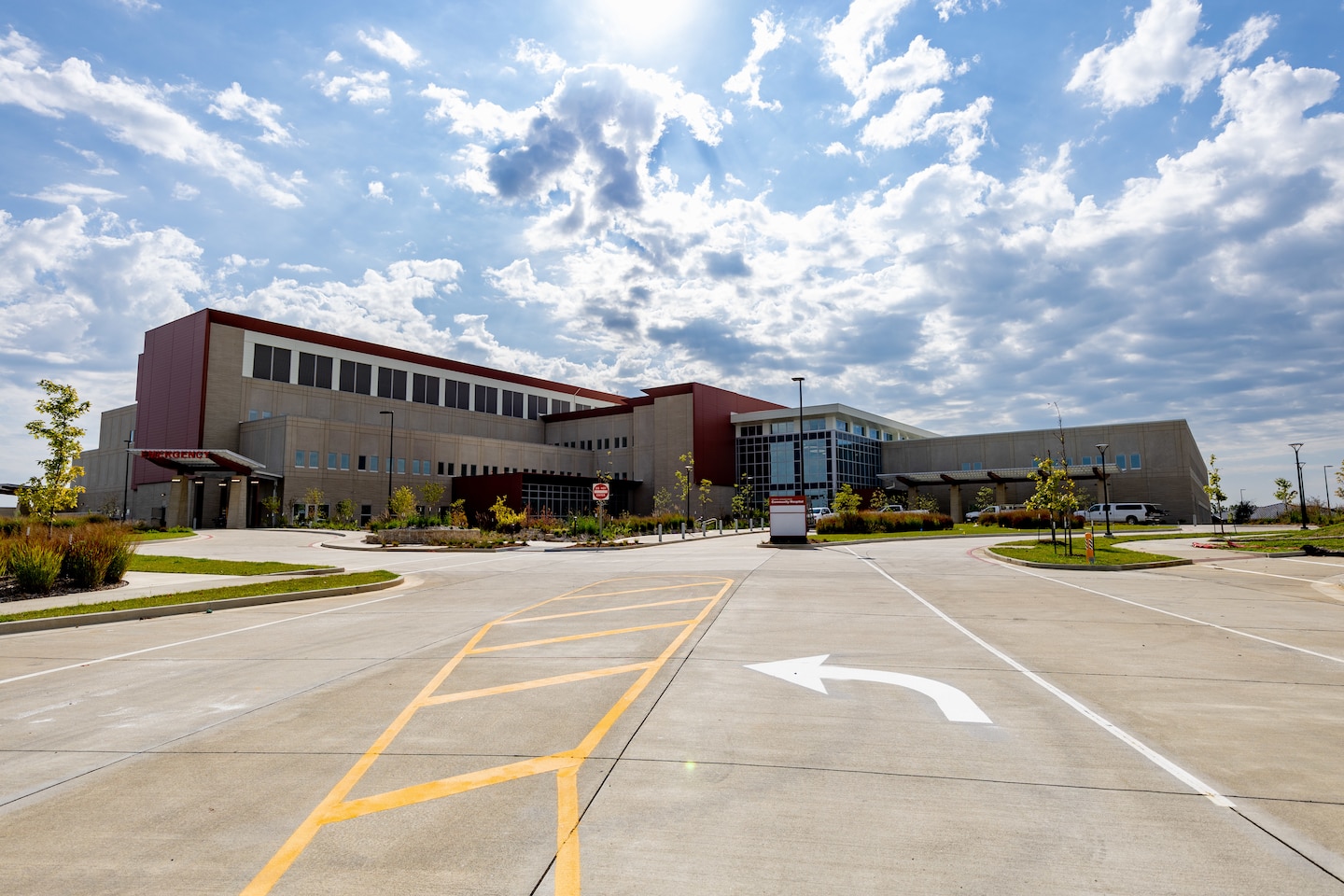 An image of a large building on a bright blue sky.