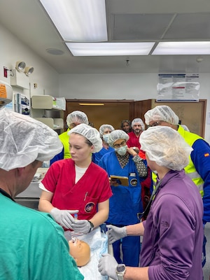 260212-N-FT324-4663. ROTA, SPAIN (February 12, 2026)— U.S. Naval Hospital Rota neonatal response team members participate in a simulated neonatal emergency alongside Spanish 061 emergency medical services personnel in the operating room at Naval Station Rota. The exercise focused on rapid assessment, stabilization, and coordinated transport of a newborn patient, strengthening interoperability with host nation partners and supporting warfighter readiness by ensuring timely, high-quality care for service members and their families. (U.S. Navy photo by Lt. Cmdr. Alicia Sacks)