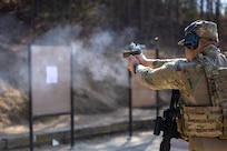 U.S. Air Force Airman 1st Class Holden P. Cooke, 145th Security Forces Squadron defender, fires a M18 pistol after transitioning from the M4A1 carbine during the Warrior Skills Course, Albemarle Police Department firing range, Albemarle, N.C., March 9, 2026.