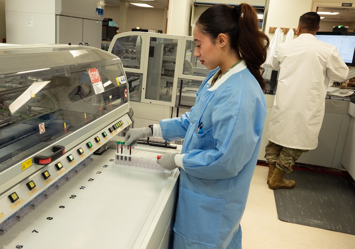 Technicians work in laboratory.