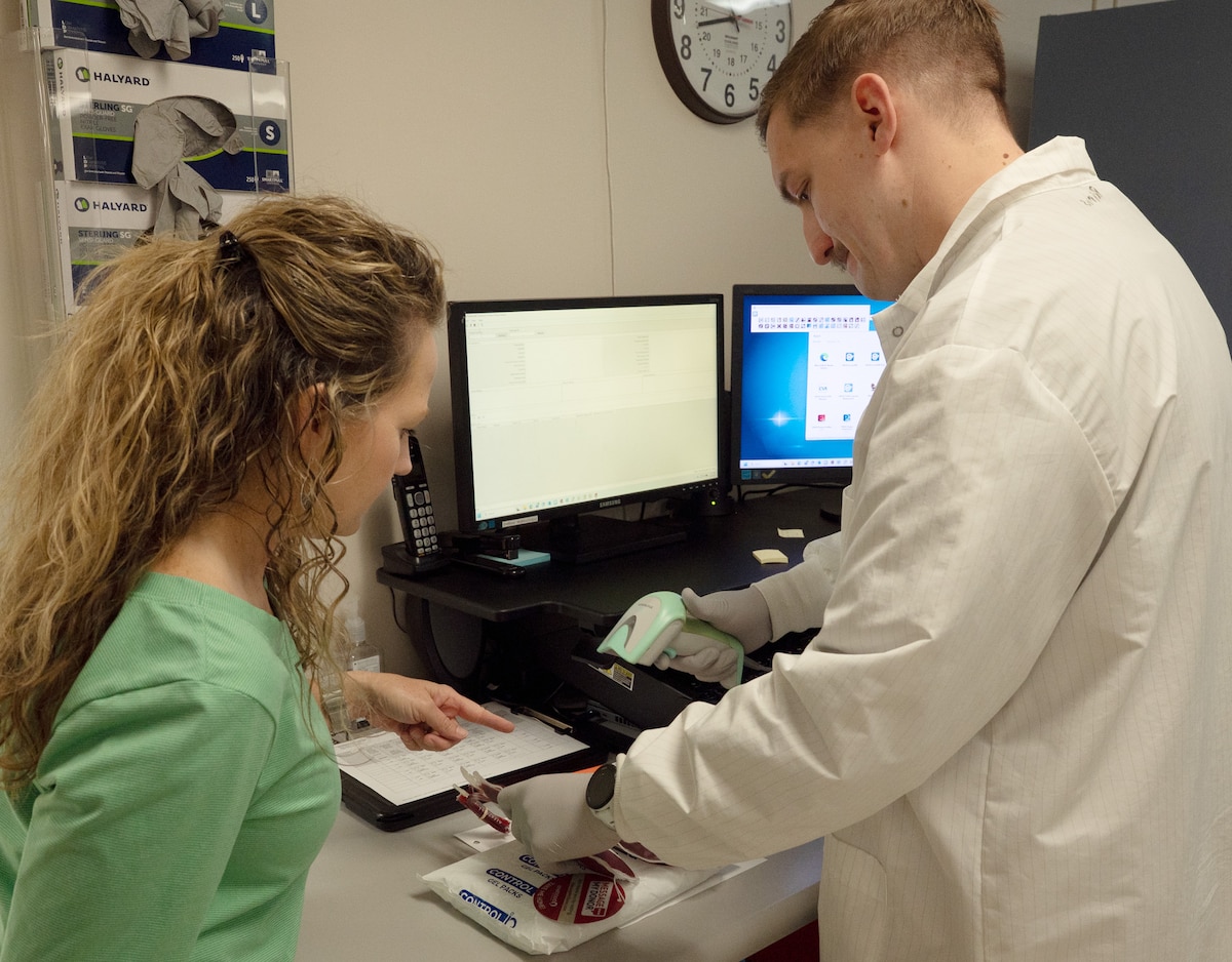 Technicians work in laboratory.