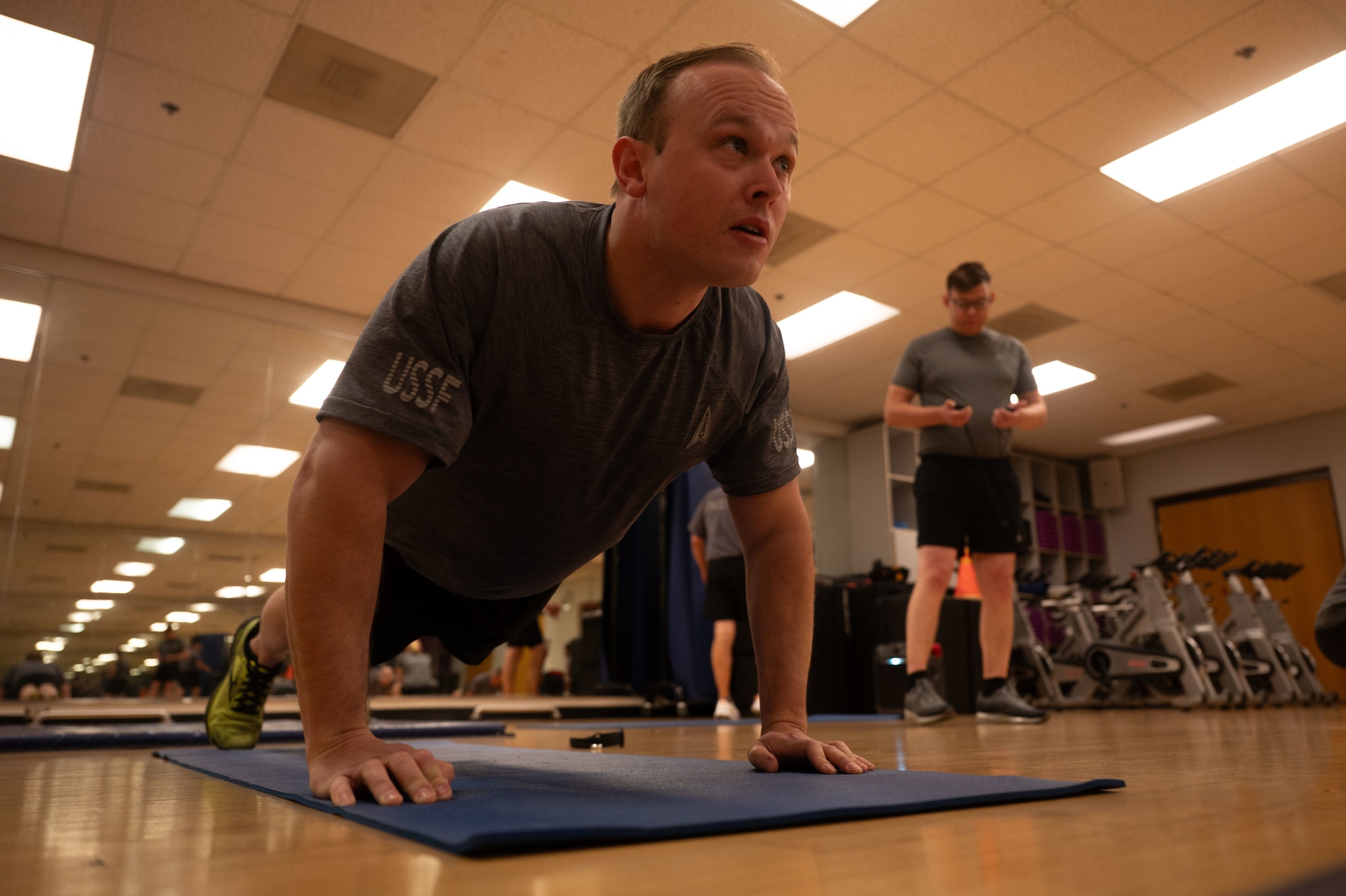U.S. Space Force Maj. Michael “Doc” Quinn, Space Forces Southern deputy director of plans, strategy and engagements, performs a pushup during a Human Performance Assessment at Davis-Monthan Air Force Base, Arizona, April 23, 2026. The HPA is the Space Force’s equivalent to the U.S. Air Force Fitness Assessment. (U.S. Air Force photo by Airman 1st Class Jaden Kidd)