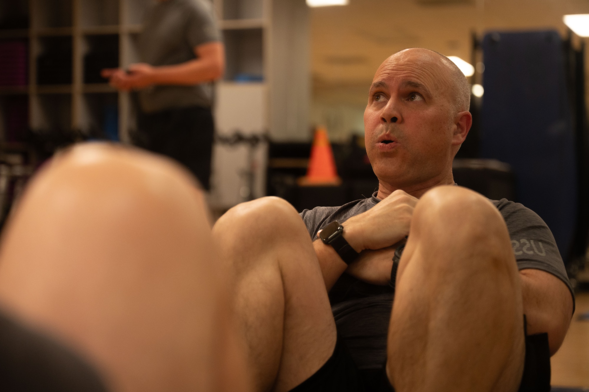U.S. Space Force Col. Brandon Alford, Space Forces Southern commander, performs a situp during a Human Performance Assessment at Davis-Monthan Air Force Base, Arizona, April 23, 2026. The HPA reflects a broader shift toward continuous, holistic fitness in the Space Force. (U.S. Air Force photo by Airman 1st Class Jaden Kidd)