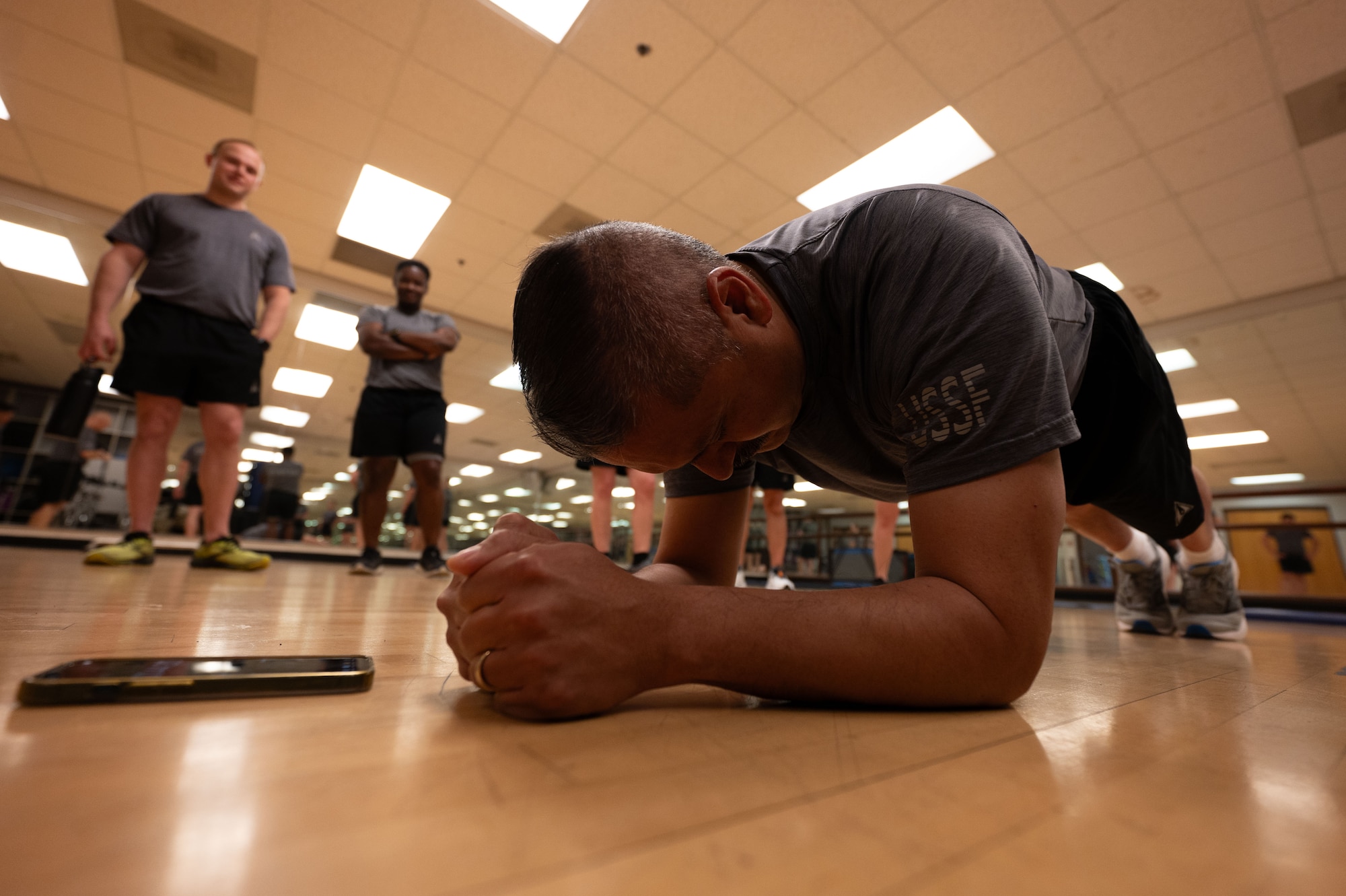 U.S. Space Force Lt. Col. Daniel Morales Jr., Space Forces Southern chief of plans, performs a plank during a Human Performance Assessment at Davis-Monthan Air Force Base, Arizona, April 23, 2026.The HPA is part of an ongoing effort to build consistency, accountability and long-term readiness across the force. Through the HPA, Space Forces Southern continues to build a culture focused on readiness, resilience, and sustained performance in support of joint operations across the region. (U.S. Air Force photo by Airman 1st Class Jaden Kidd)