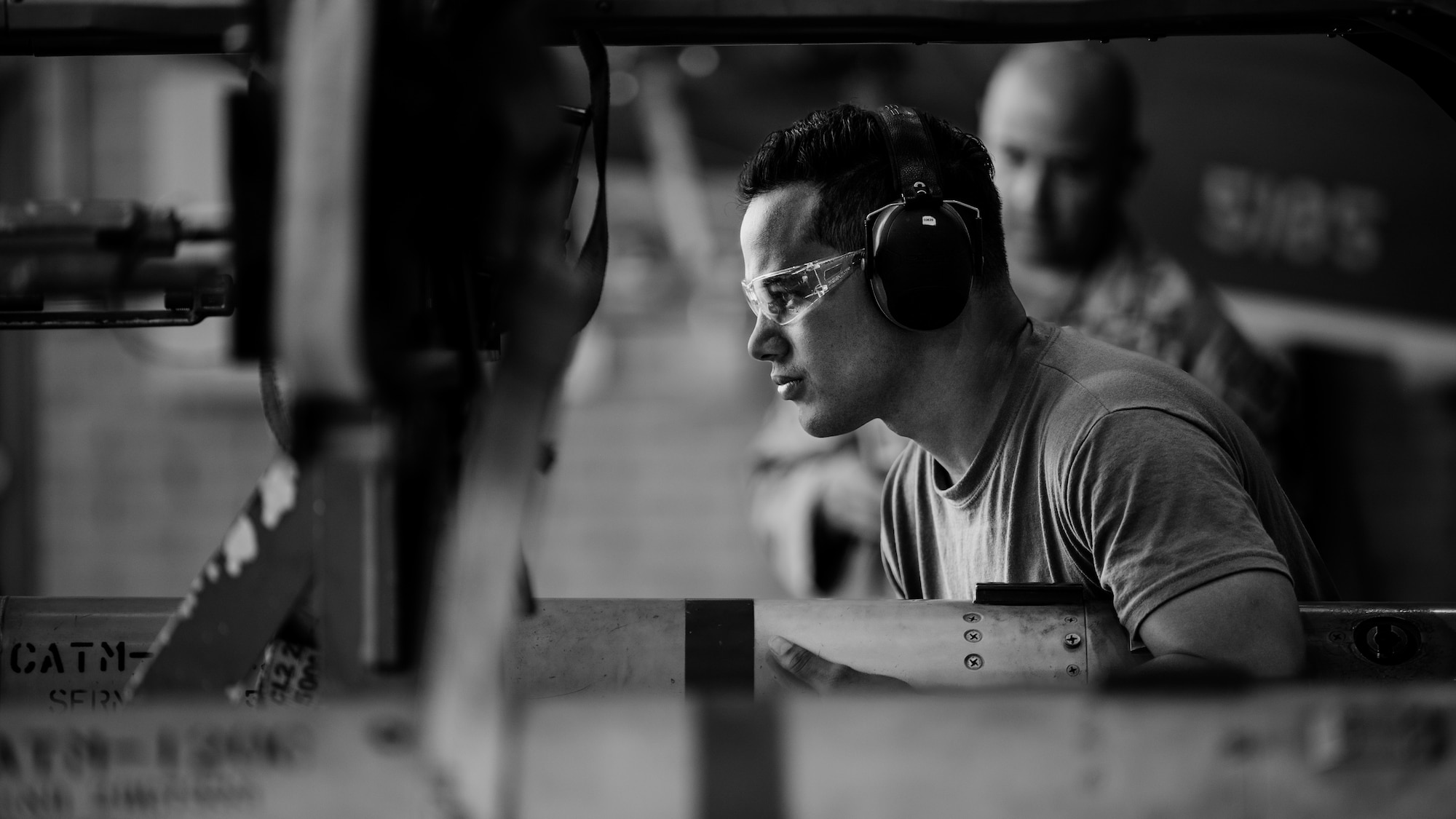 U.S. Air Force Senior Airman Eduardo Bell, 61st Aircraft Maintenance Unit weapons load crew member.