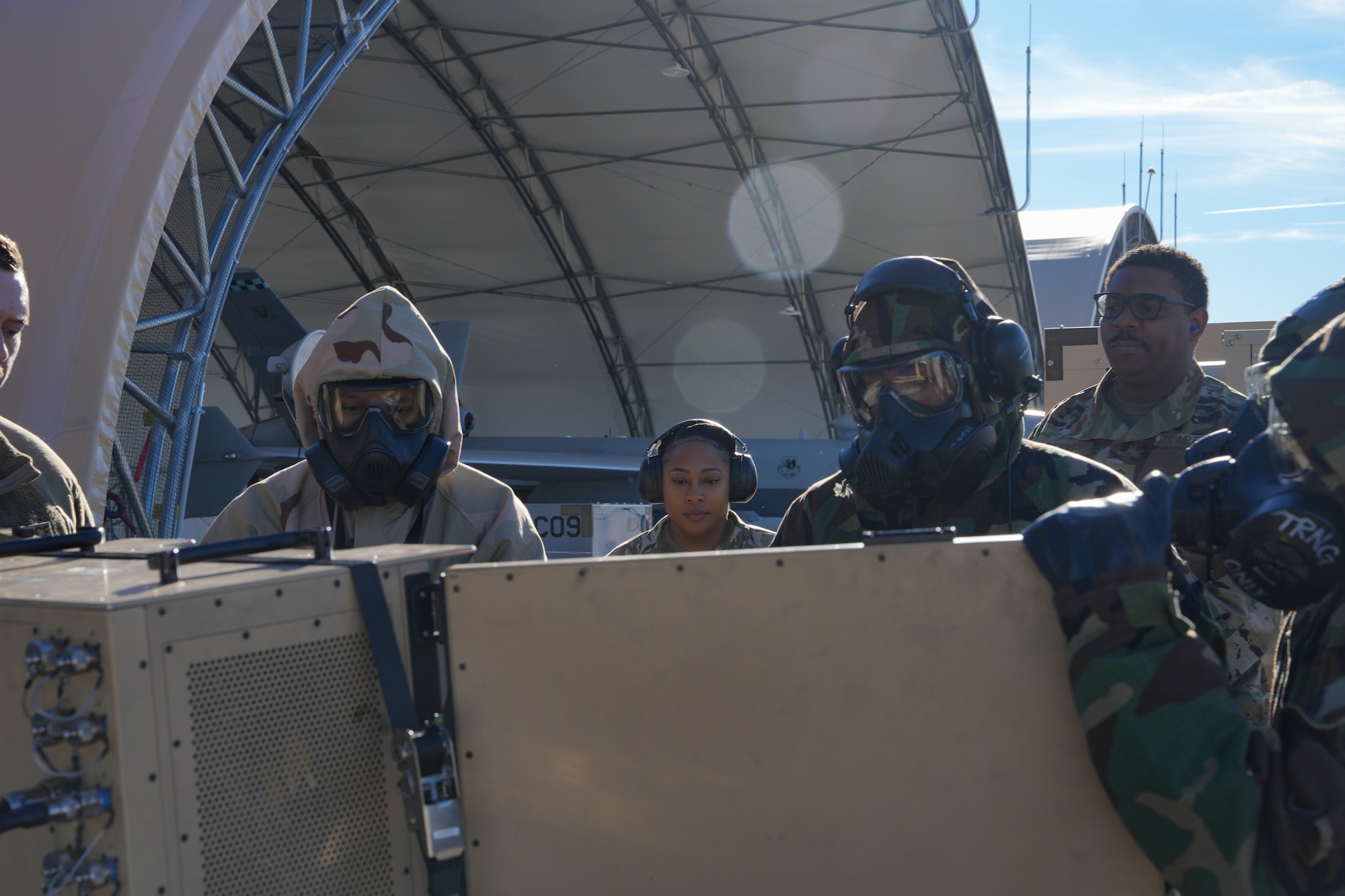 U.S. Air Force Chief Master Sgt. Jonna Martin, 25th Attack Wing command chief, observes 25th Aircraft Maintenance Squadron Airmen performing preflight operations during a training exercise at Creech Air Force Base, Nevada, Jan. 14, 2026.