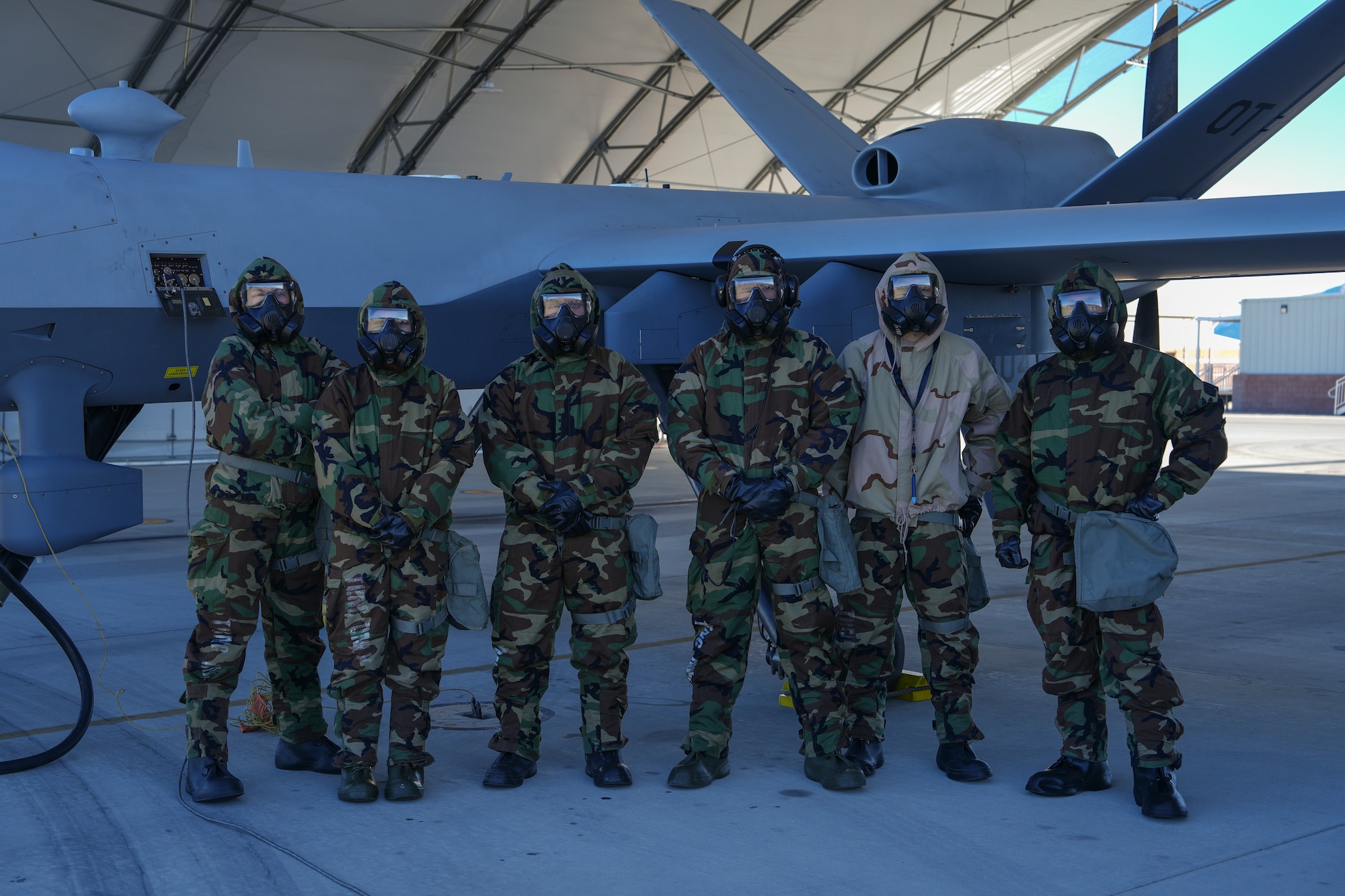 U.S. Airmen assigned to the 25th Aircraft Maintenance Squadron pose for a group photo during a training exercise at Creech Air Force Base, Nevada, Jan. 14, 2026.