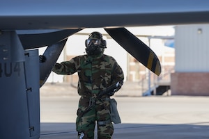 A U.S. Airman assigned to the 25th Aircraft Maintenance Squadron performs a preflight inspection on an MQ-9 Reaper during a training exercise at Creech Air Force Base, Nevada, Jan. 14, 2026.